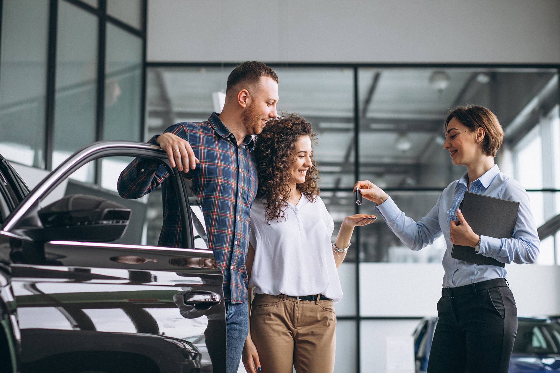 Couple choosing a new vehicle in the Santee CDJR showroom